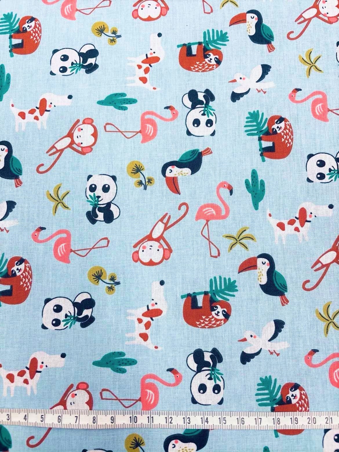 Coton 150 - Animaux du monde fond bleu ciel