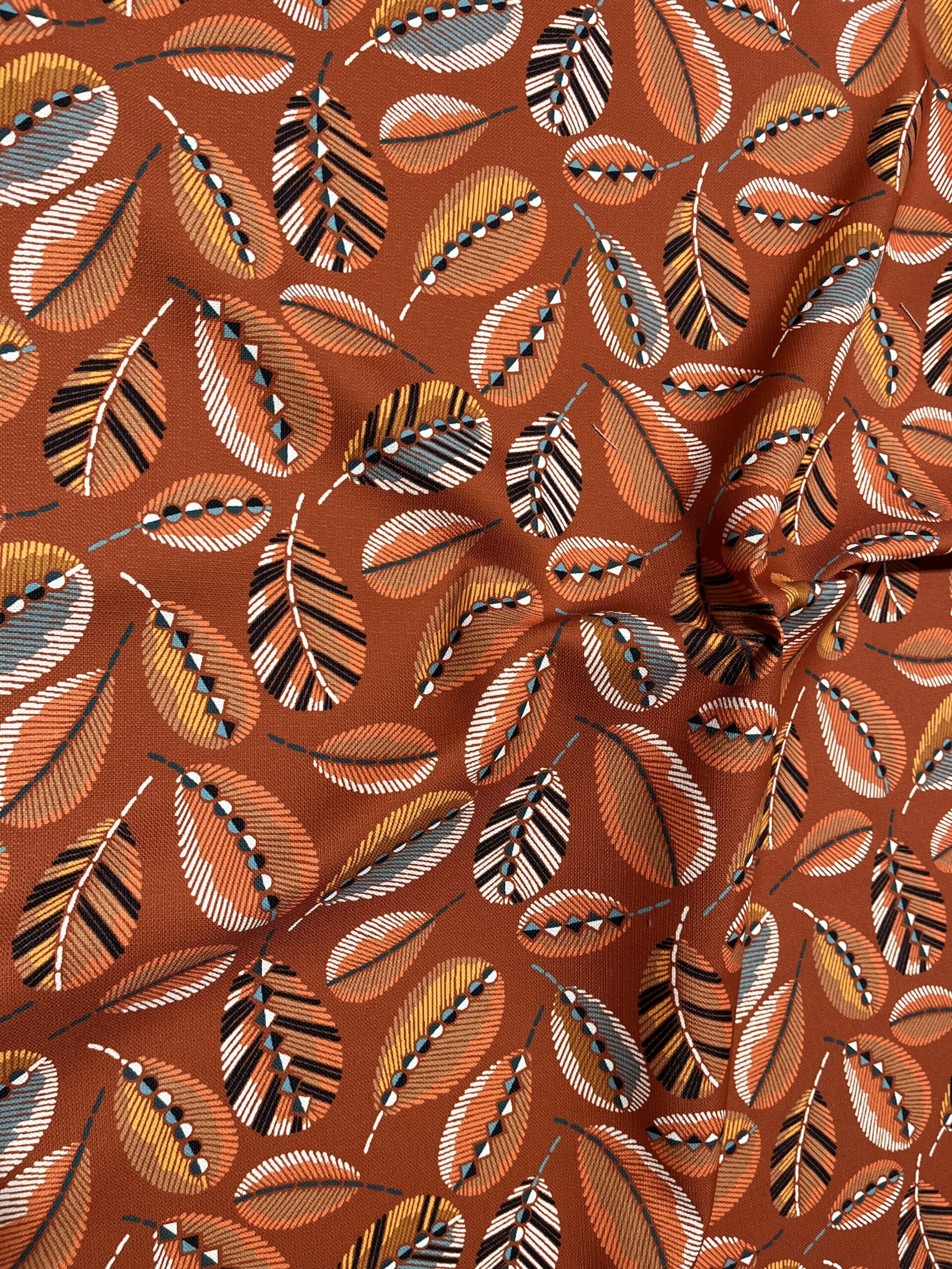 Tissu toile extérieure Plumette terracotta.