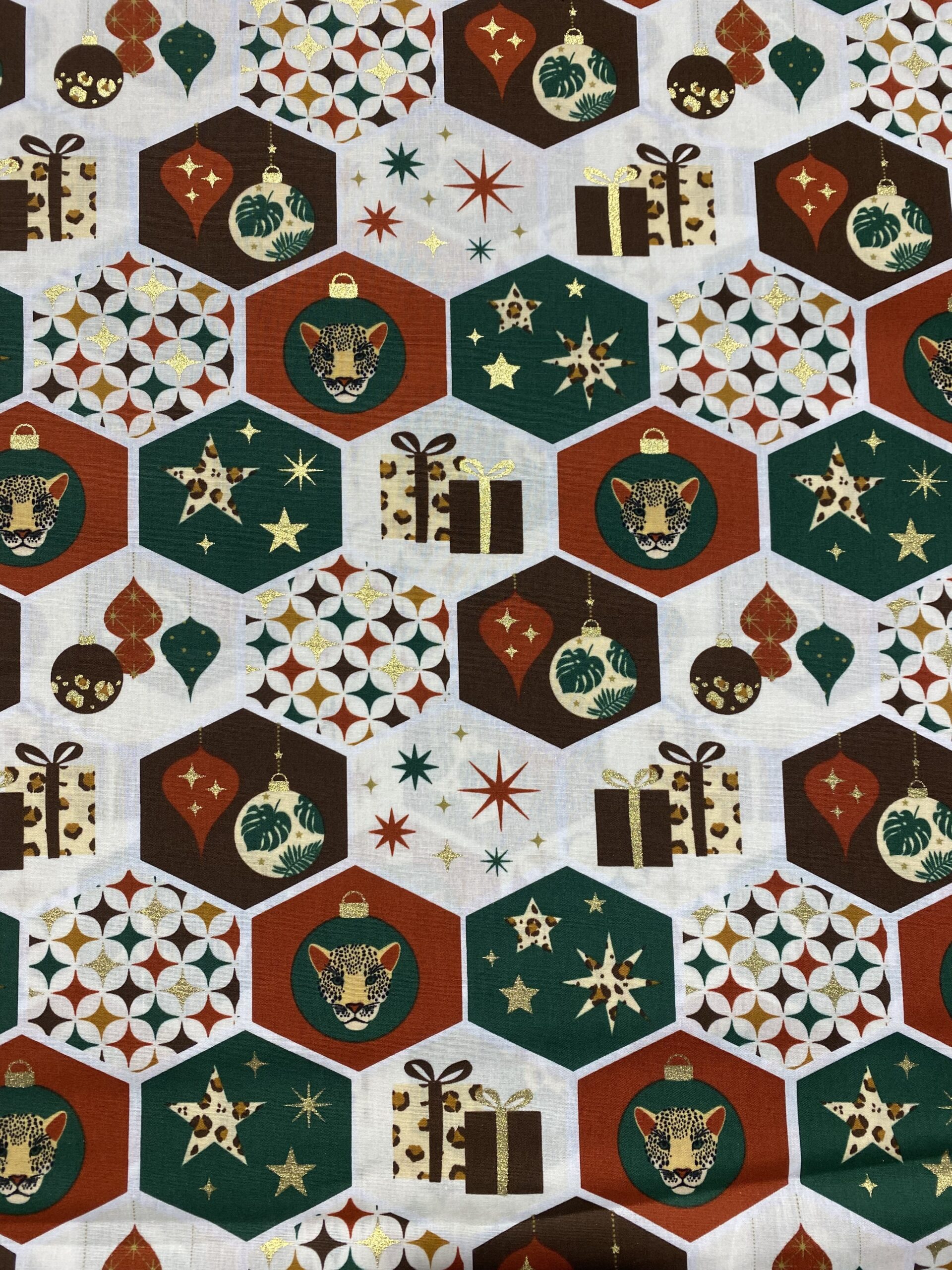 Motifs cadeaux et léopards doré fond blanc